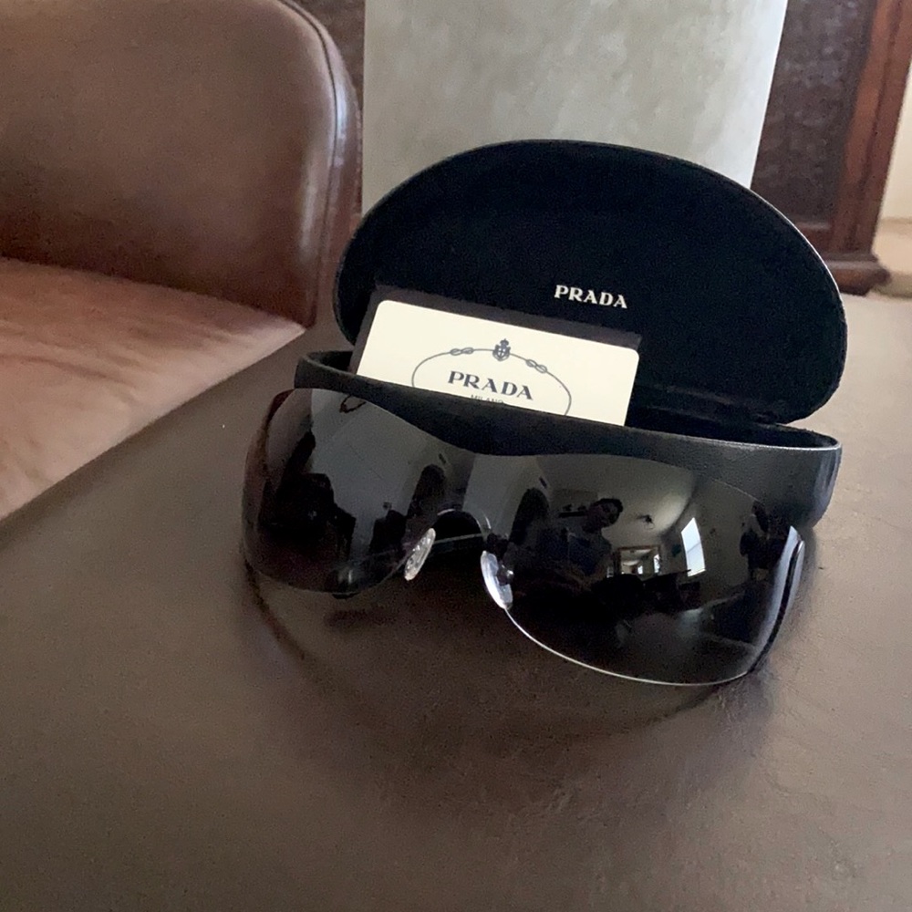 PRADA unisex wrap sunglasses.